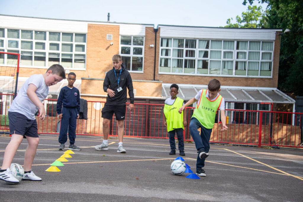 a picture of students playing football