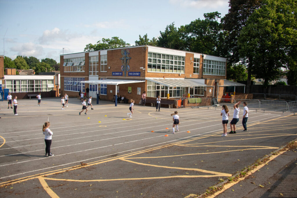 a picture of students playing on the playground