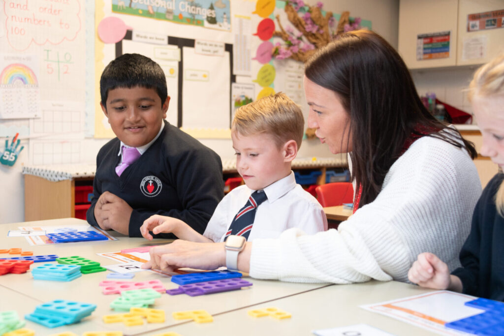 a picture of students doing puzzles