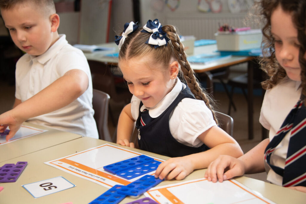 a picture of students doing puzzles